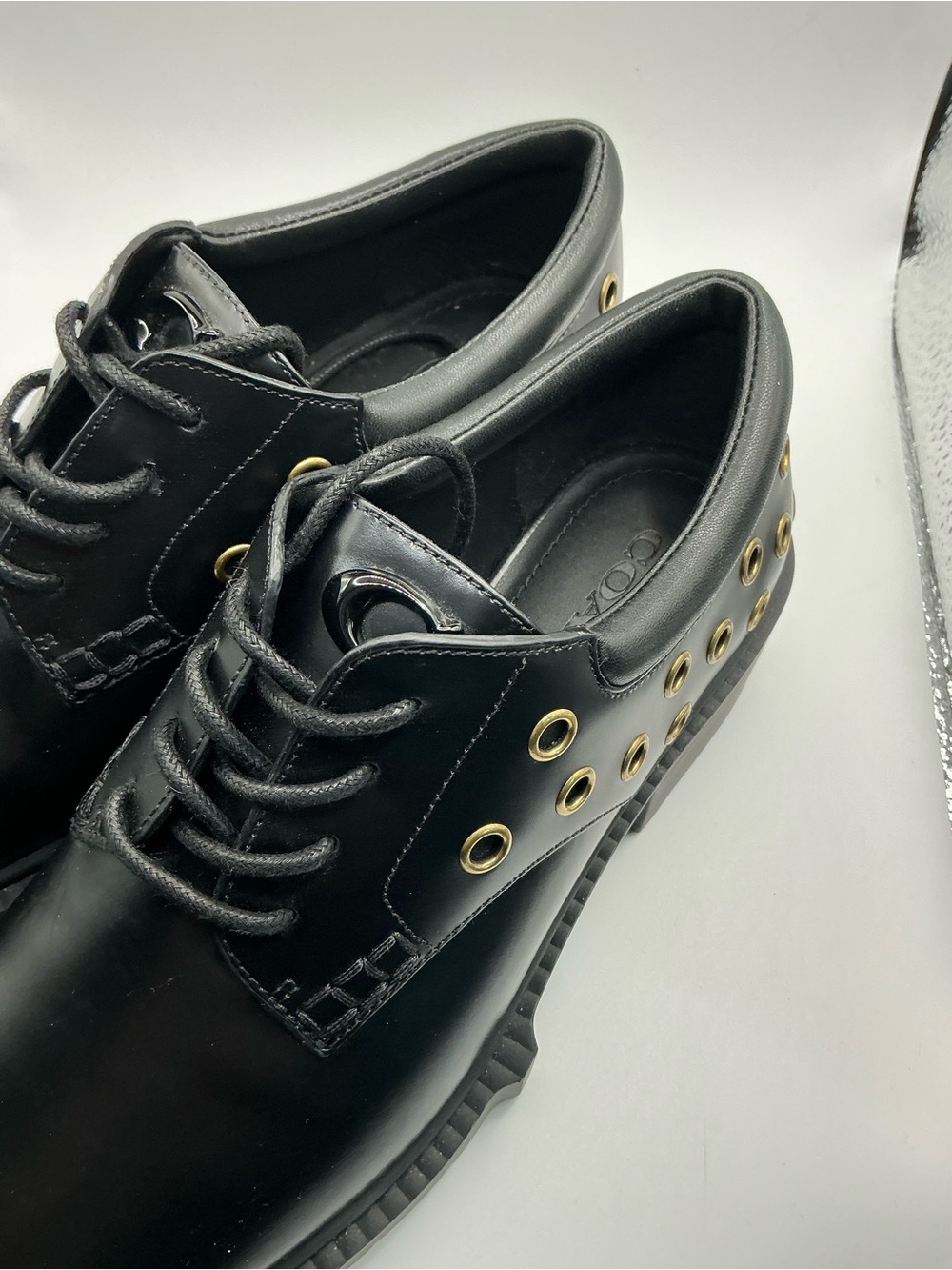 Coach Black Leather Lug Sole Loafers with Gold Eyelet Detail - Picture 6 of 9